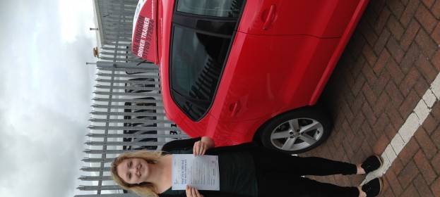 Shona passed her Driving Test with flying colours.
