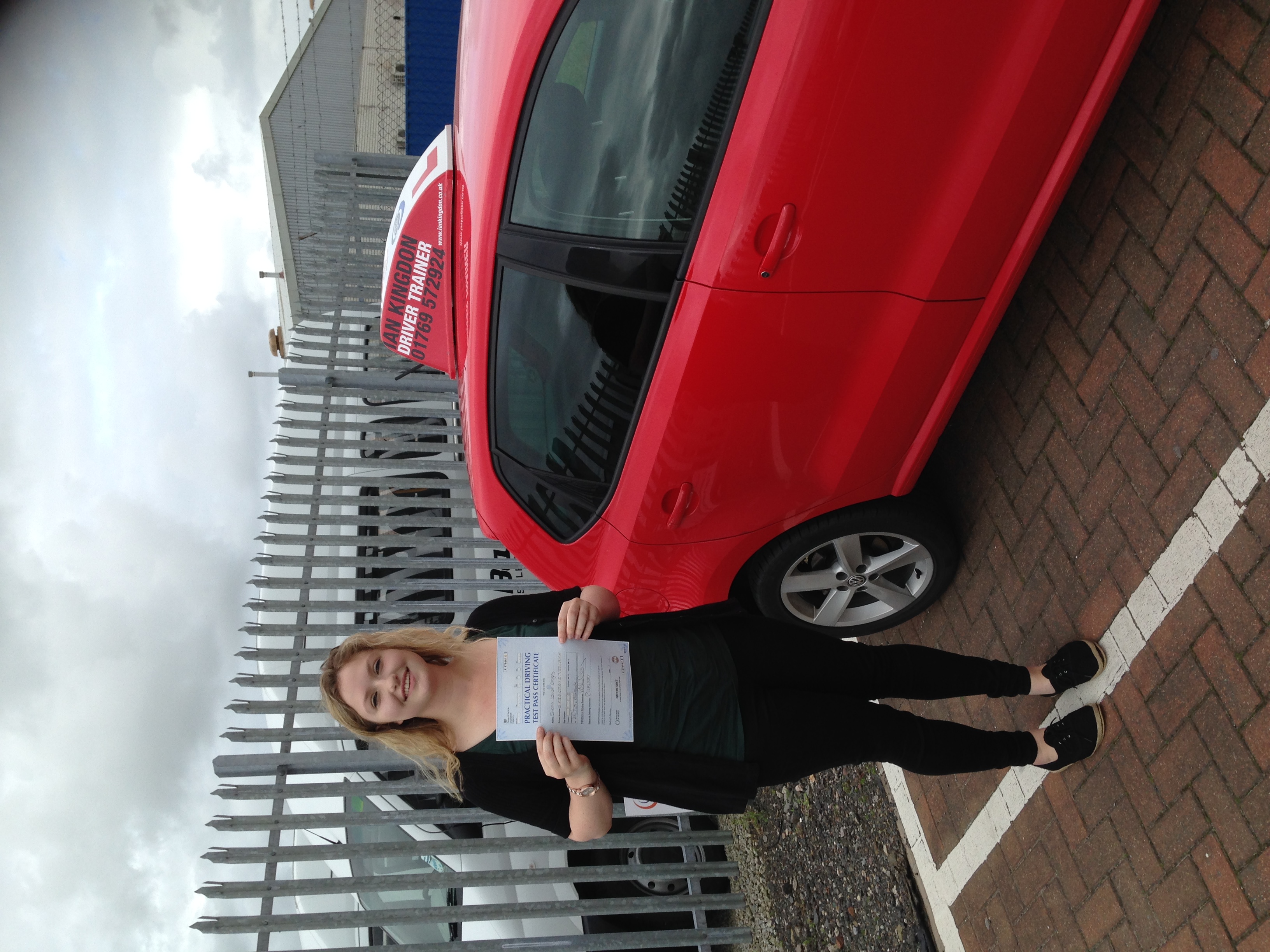 Shona passed her Driving Test with flying colours.
